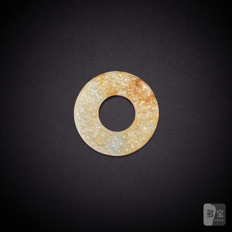 A white jade 'grain' disc, huan, Han dynasty | 漢 白玉穀紋環 - 图2